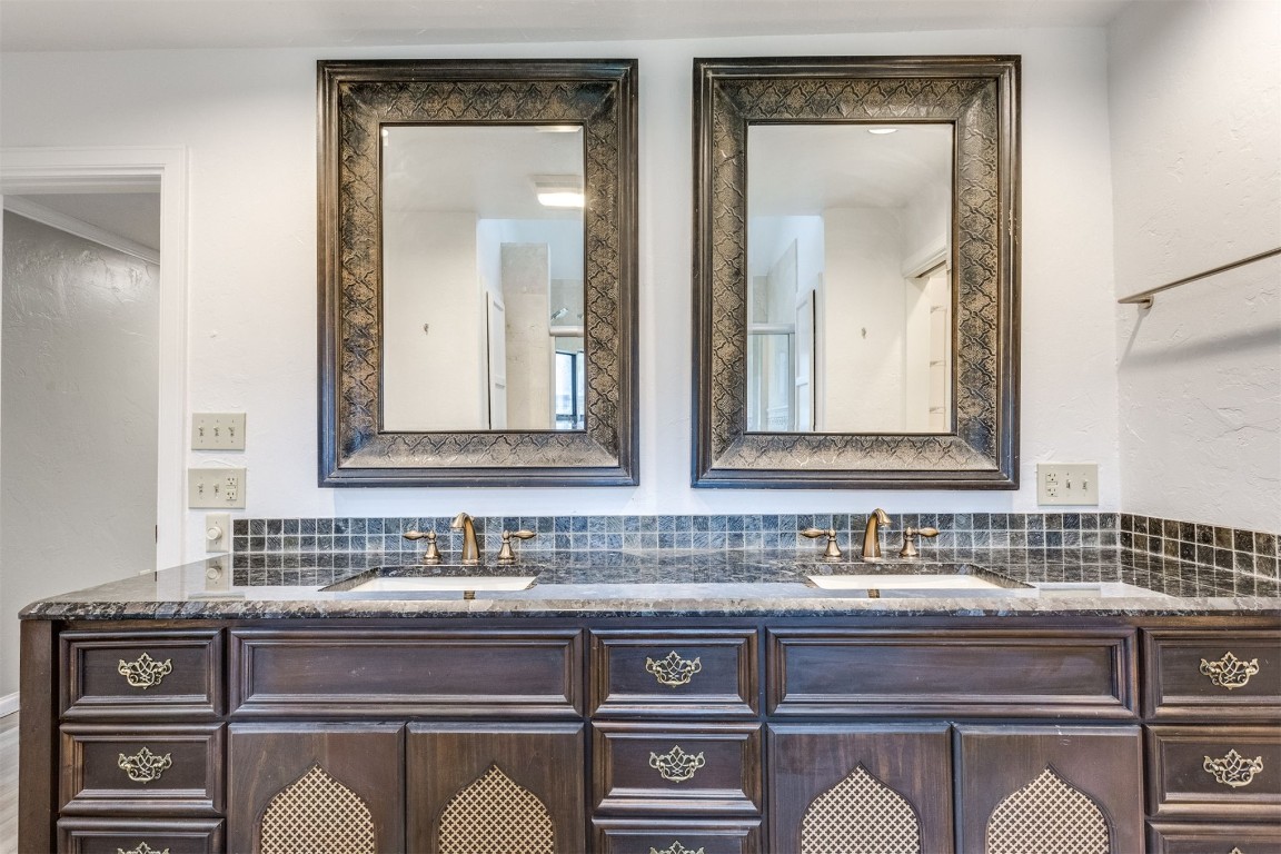 3904 Spyglass Road, Oklahoma City, OK 73120 bathroom featuring dual vanity