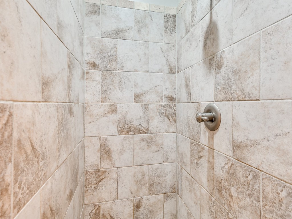 8208 NW 160th Terrace, Edmond, OK 73013 room details with tiled shower