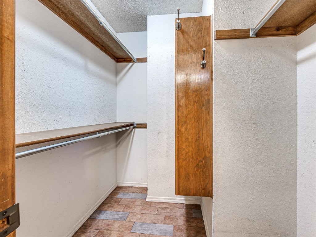 7616 NW 113th Street, Oklahoma City, OK 73162 spacious closet with tile flooring