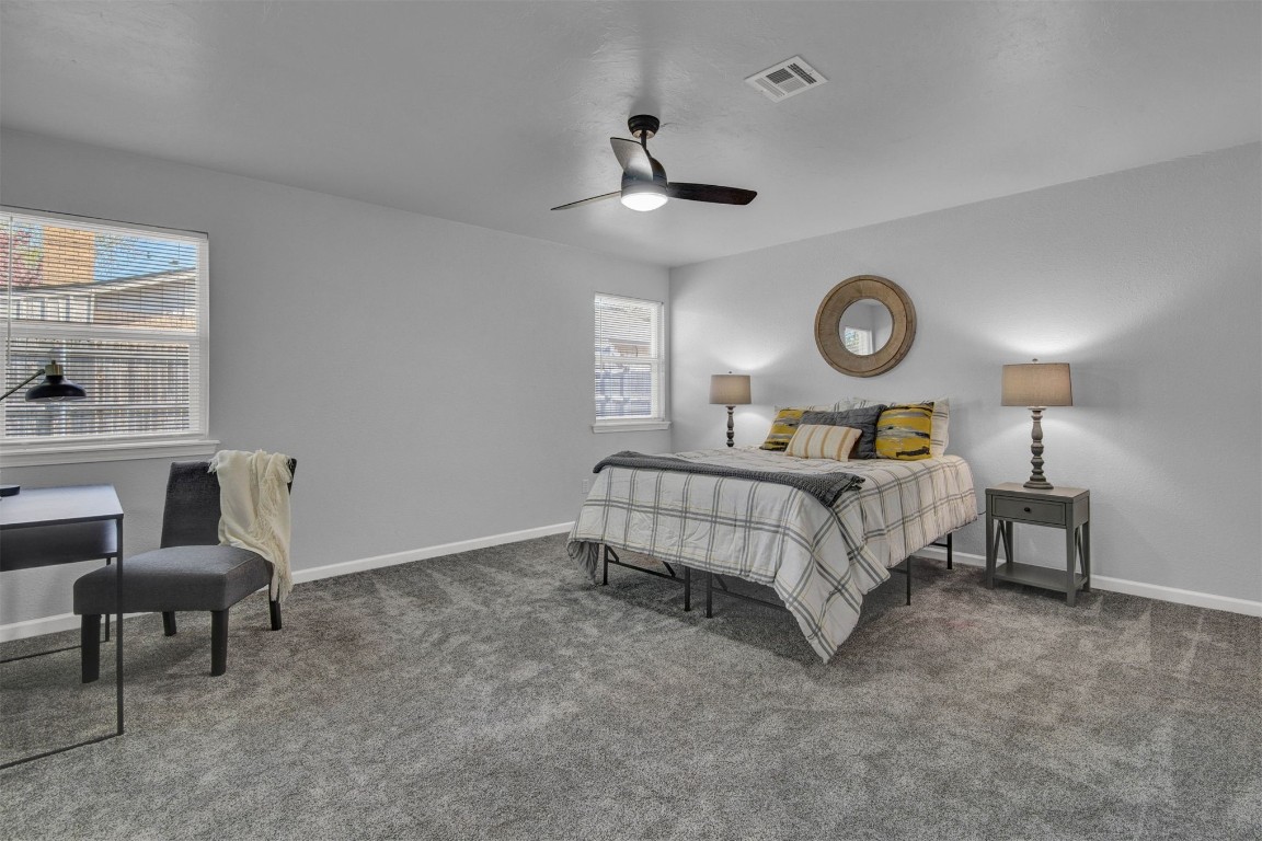 3012 Robin Road, Midwest City, OK 73110 carpeted bedroom featuring ceiling fan