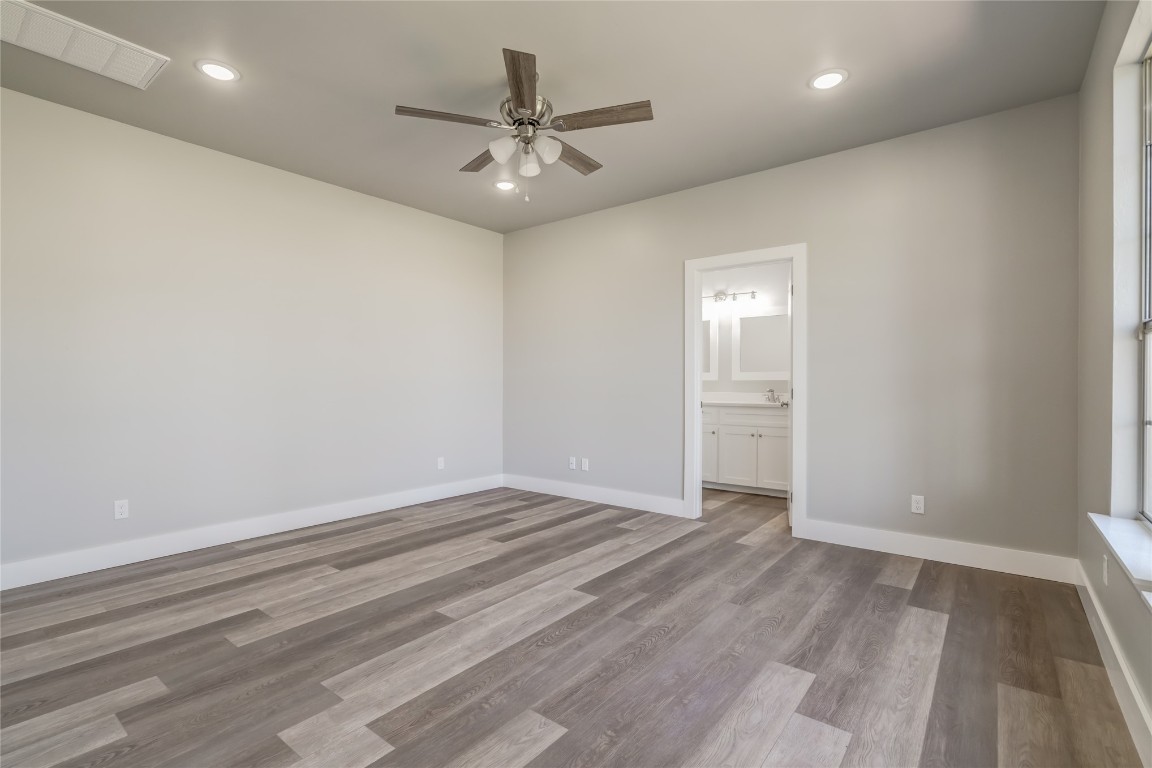 1525 NE 34th Street, Oklahoma City, OK 73111 unfurnished room with light hardwood / wood-style flooring and ceiling fan