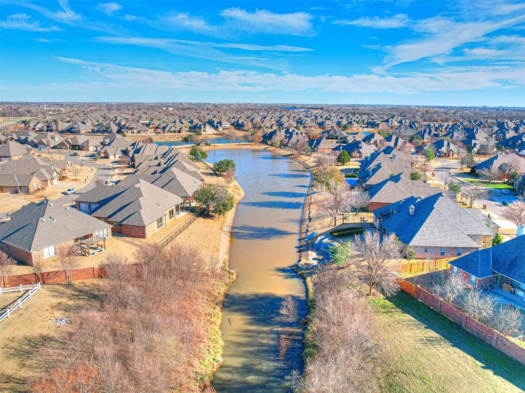 13512 Borgata Lane, Oklahoma City, OK 73170 aerial view featuring a water view
