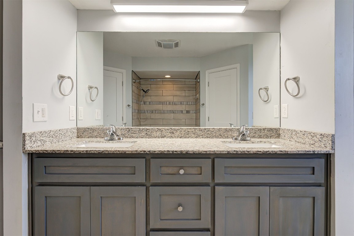 10101 Southridge Drive, Oklahoma City, OK 73159 bathroom with double sink vanity