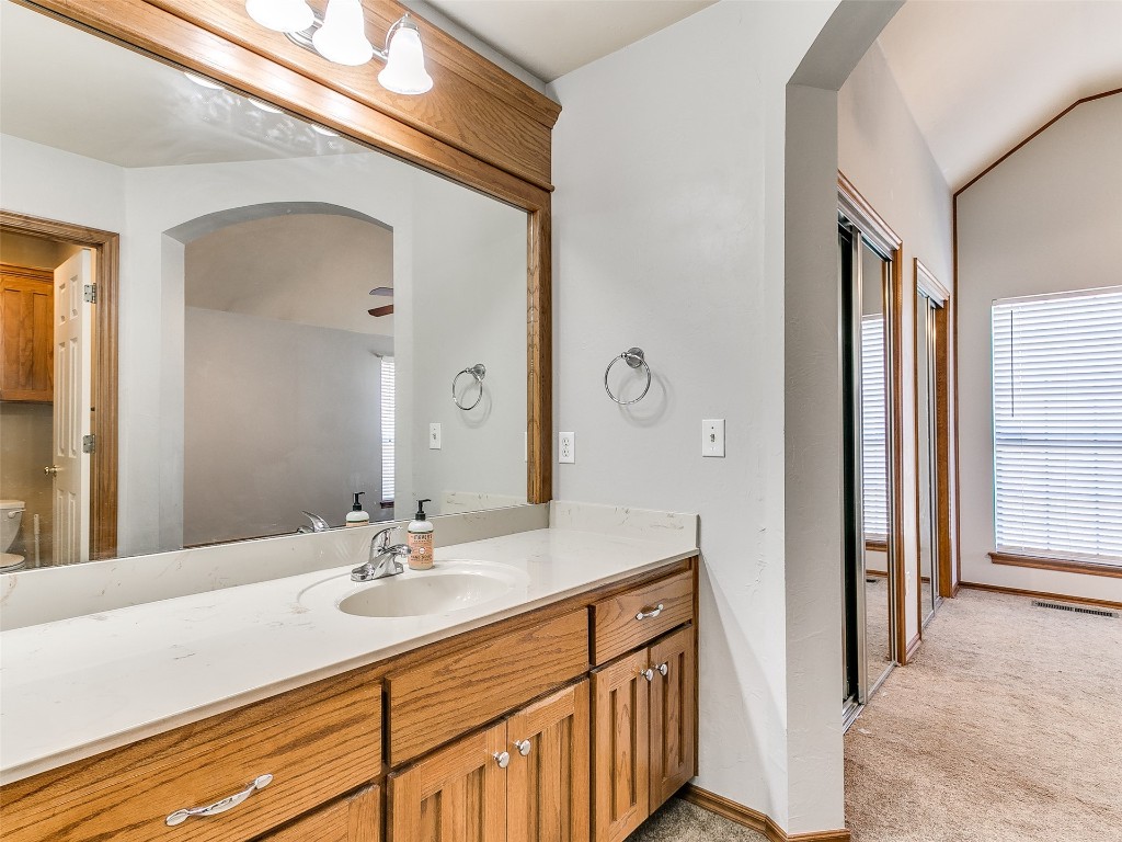 1013 SW 126th Street, Oklahoma City, OK 73170 bathroom featuring vanity and toilet
