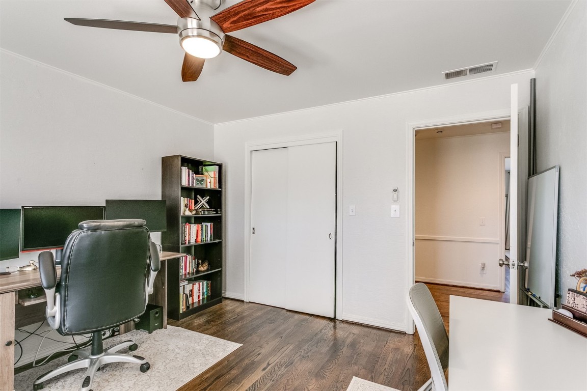 1504 Brighton Avenue, Oklahoma City, OK 73120 office area featuring ceiling fan, dark wood-type flooring, and ornamental molding