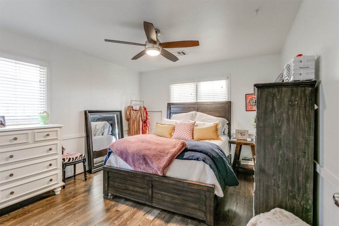 1504 Brighton Avenue, Oklahoma City, OK 73120 bedroom with ceiling fan and hardwood / wood-style floors