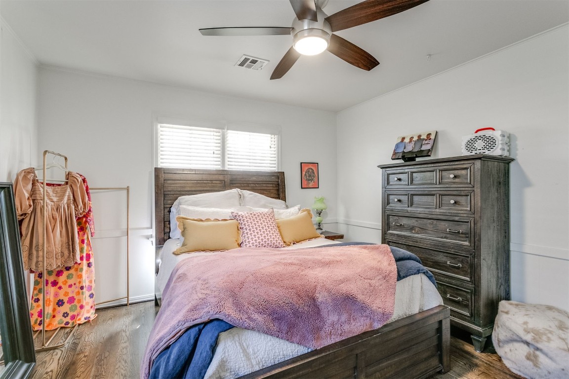 1504 Brighton Avenue, Oklahoma City, OK 73120 bedroom featuring ceiling fan and dark hardwood / wood-style floors