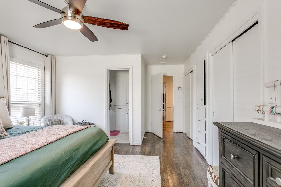 1504 Brighton Avenue, Oklahoma City, OK 73120 bedroom featuring dark hardwood / wood-style flooring and ceiling fan