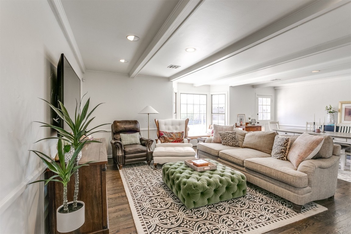 1504 Brighton Avenue, Oklahoma City, OK 73120 living room with ornamental molding, beamed ceiling, and dark wood-type flooring