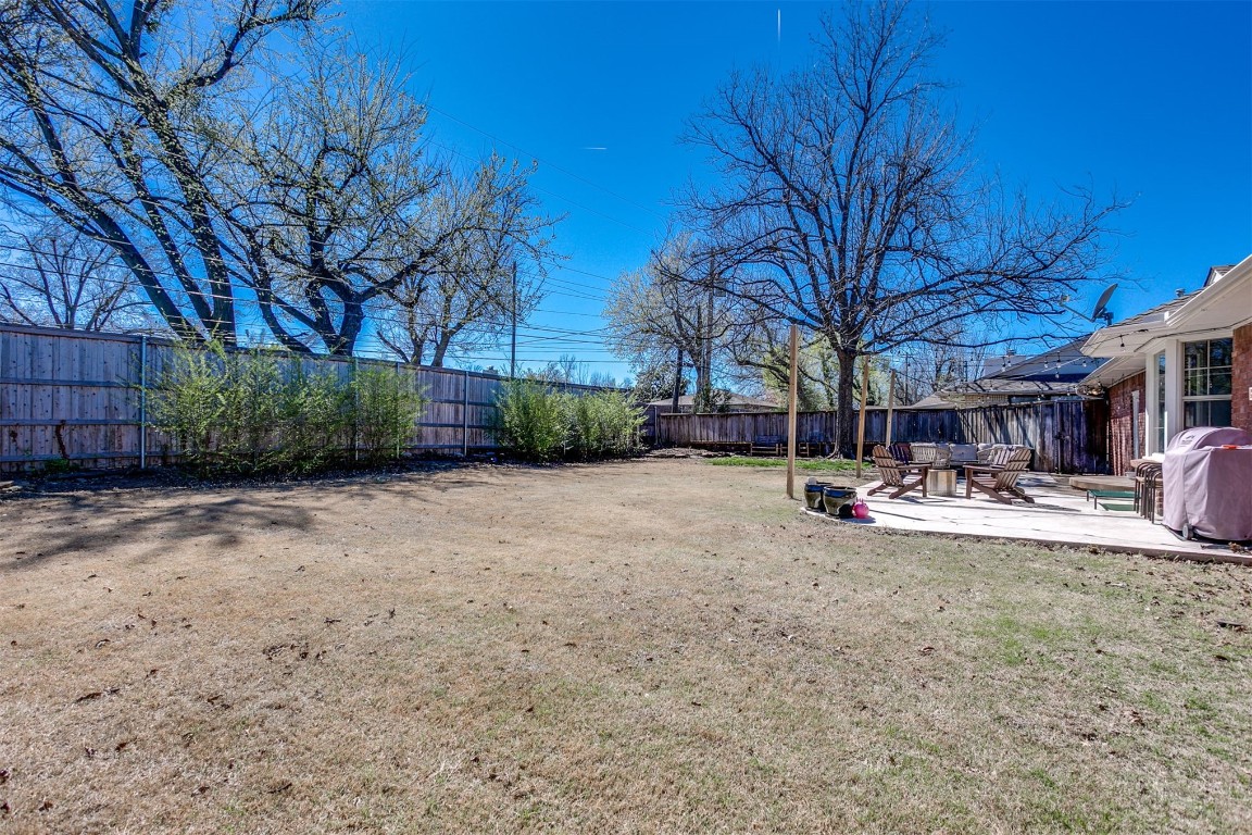 1504 Brighton Avenue, Oklahoma City, OK 73120 view of yard featuring a patio