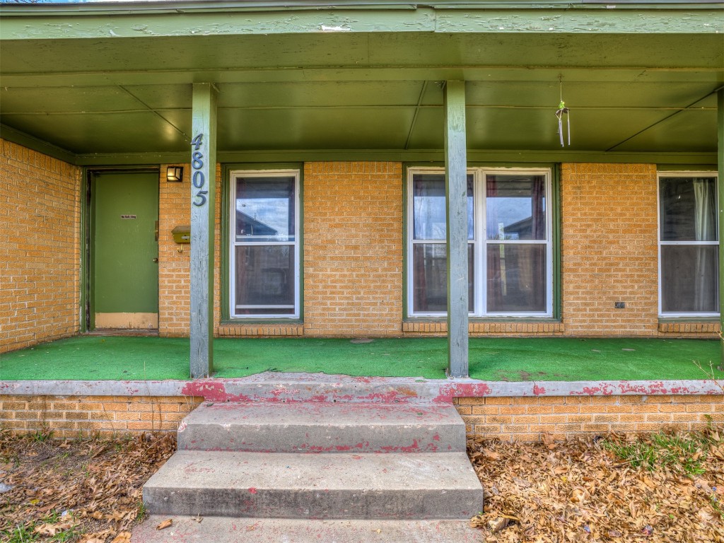 4805 N Hamilton Drive, Oklahoma City, OK 73112 property entrance with a porch