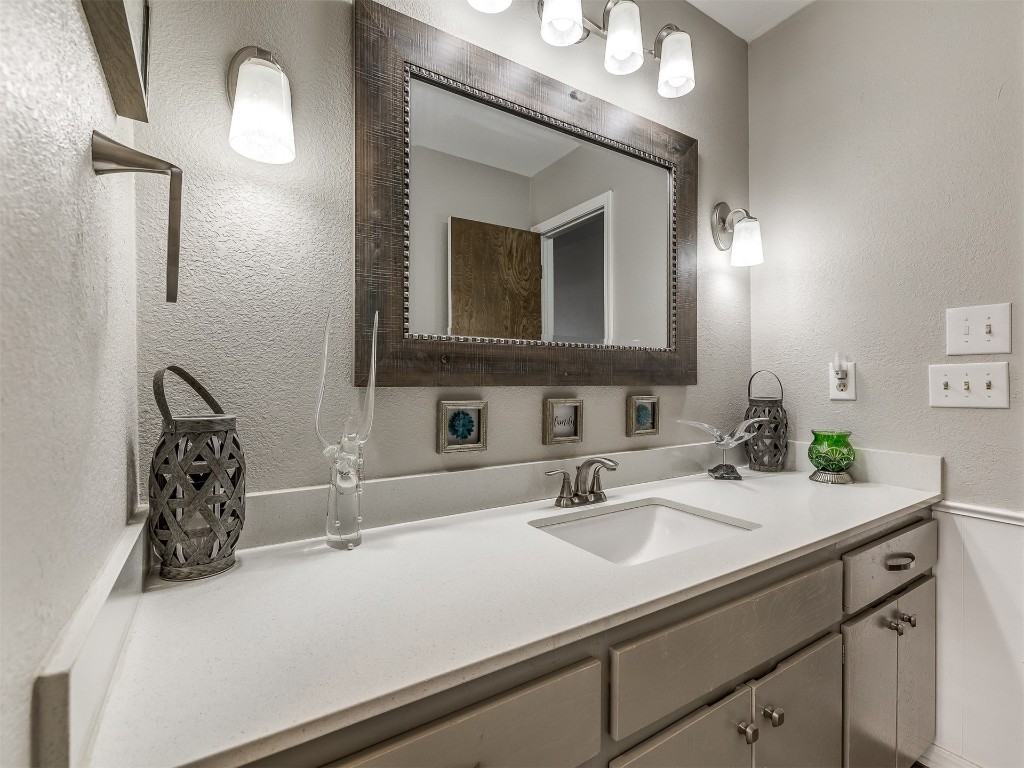 11313 Bluff Creek Drive, Oklahoma City, OK 73162 bathroom featuring vanity