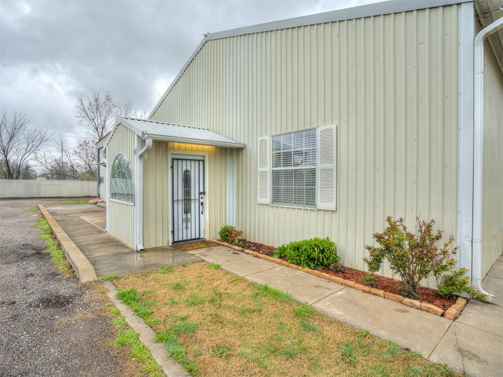 Looking for the perfect property to establish both a home and a business in Oklahoma City? Your search ends here with this incredible opportunity! Nestled on 2.37 acres, this property gasconades four spacious shops, including sizes of 30x40, 17x60x18, 20x30, and 20x40 – providing ample space for all your business needs. Attached to three of the shops is a recently updated living space, featuring three bedrooms, a full bathroom, a fully equipped kitchen, two living areas, and a convenient laundry room. The house is elegantly tiled throughout and equipped with a comprehensive home surveillance system for added security. The versatility of this property presents endless possibilities for investment and personal use. Don't let this amazing opportunity slip through your fingers!