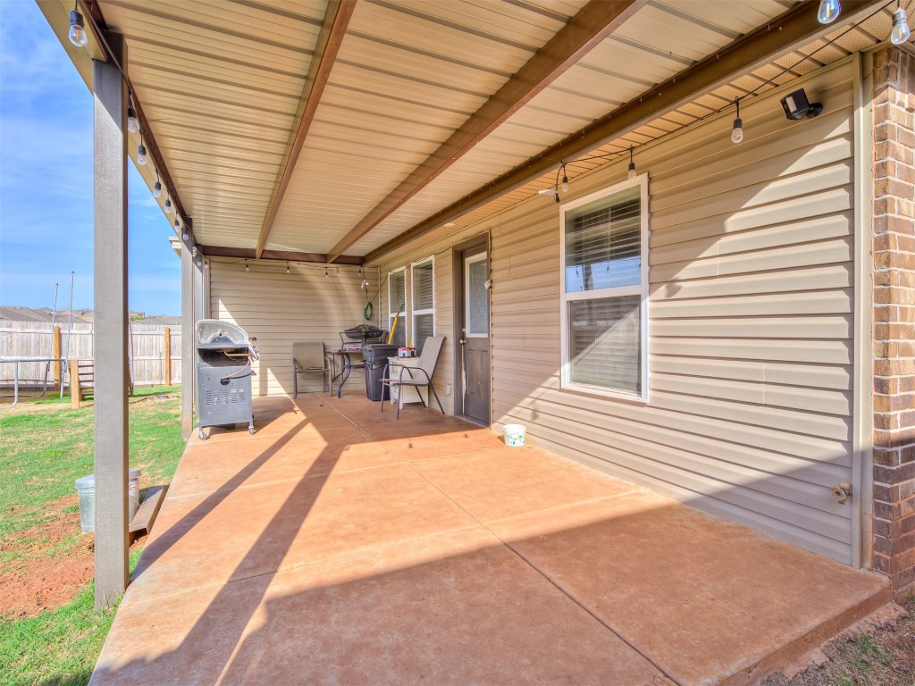 11016 NW 99th Street, Yukon, OK 73099 view of patio / terrace featuring a grill