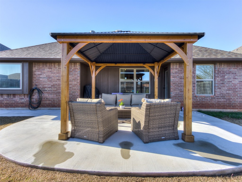 3433 NW 162nd Street, Edmond, OK 73013 view of patio / terrace with an outdoor living space