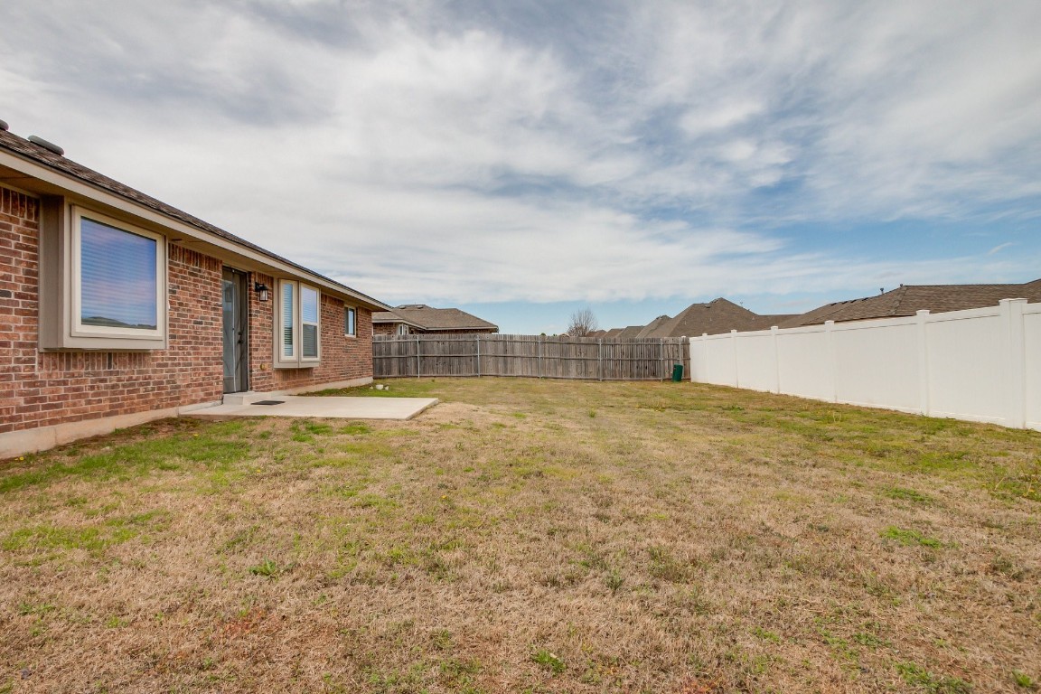 1311 SE 17th Street, Newcastle, OK 73065 view of yard with a patio area