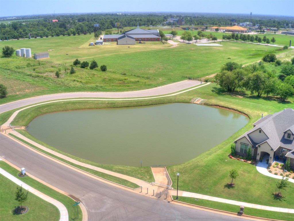4325 SW 129th Street, Oklahoma City, OK 73173 drone / aerial view with a water view