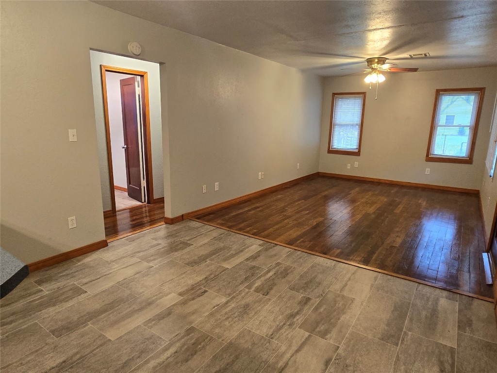 520 S Sooner Road, Del City, OK 73110 spare room featuring light hardwood / wood-style floors and ceiling fan