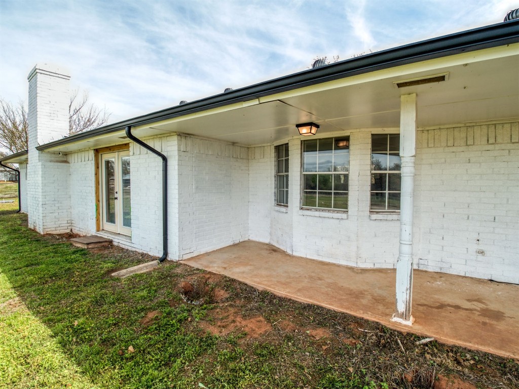 805 S Hwy 76 Highway, Newcastle, OK 73065 rear view of property with a patio