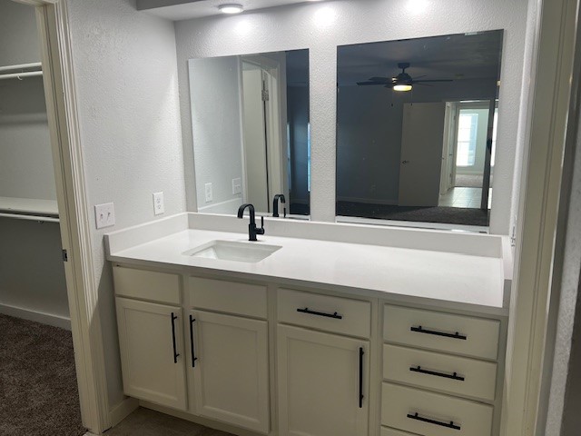 10117 Southridge Drive, Oklahoma City, OK 73159 bathroom featuring ceiling fan and vanity