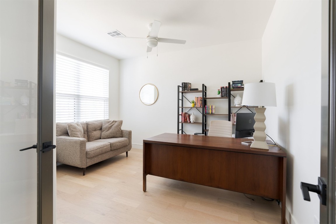 2532 Amante Court, Edmond, OK 73034 office area featuring light hardwood / wood-style flooring and ceiling fan