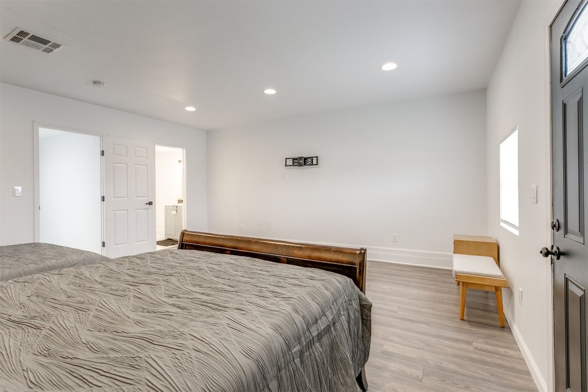 3313 Sherman Avenue, Oklahoma City, OK 73111 bedroom featuring light wood-type flooring