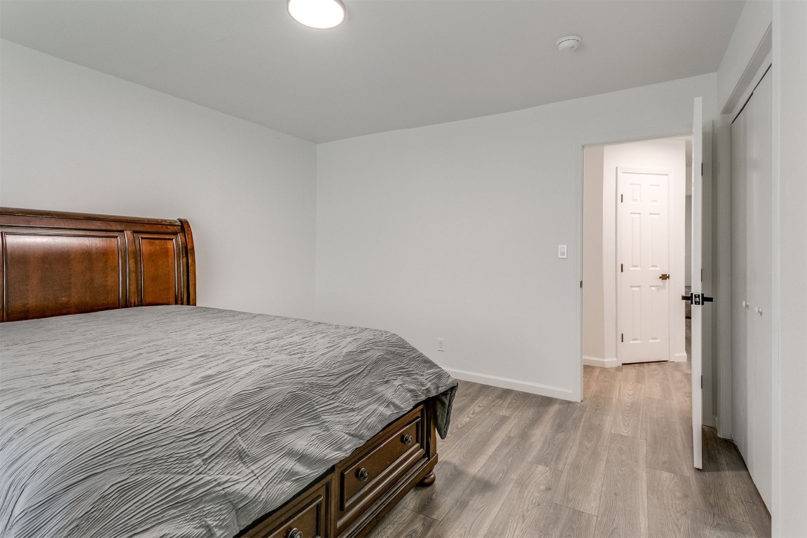 3313 Sherman Avenue, Oklahoma City, OK 73111 bedroom with a closet and light wood-type flooring