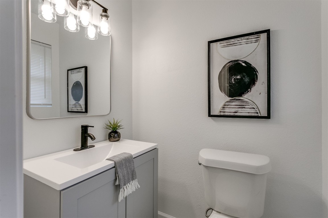 3313 Sherman Avenue, Oklahoma City, OK 73111 bathroom featuring toilet and vanity