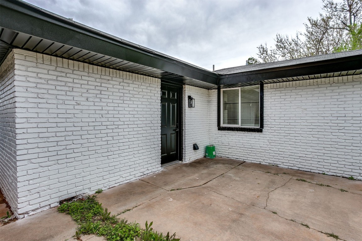 3313 Sherman Avenue, Oklahoma City, OK 73111 view of home's exterior featuring a patio