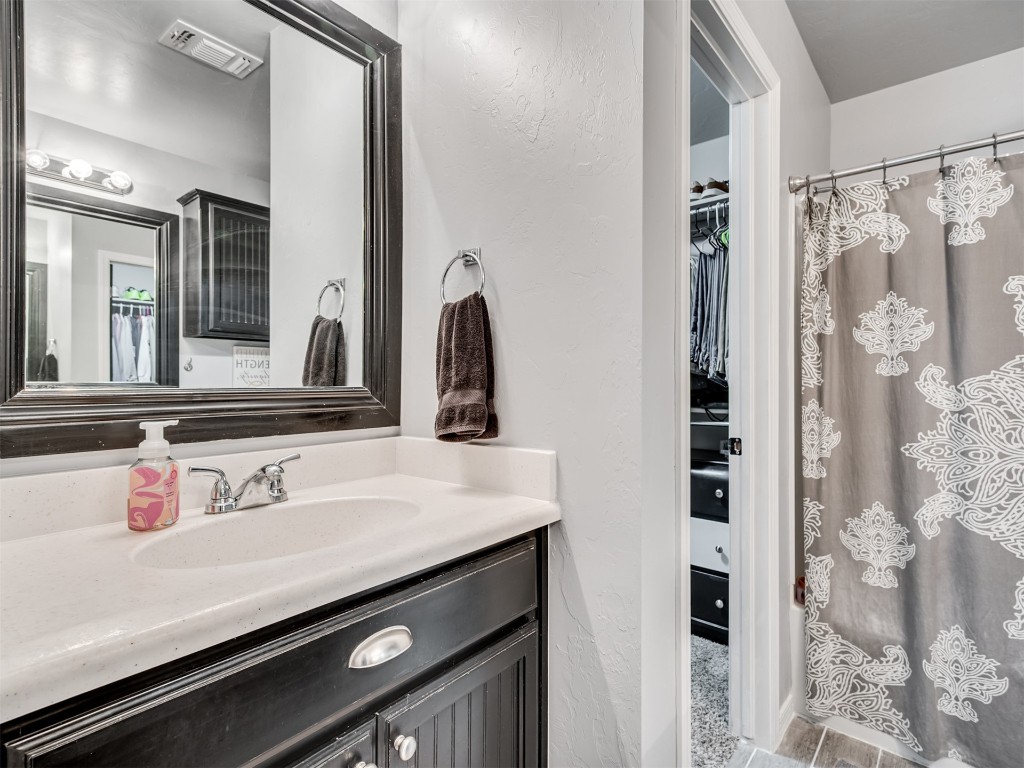 18620 Ochoa Drive, Edmond, OK 73012 bathroom with oversized vanity