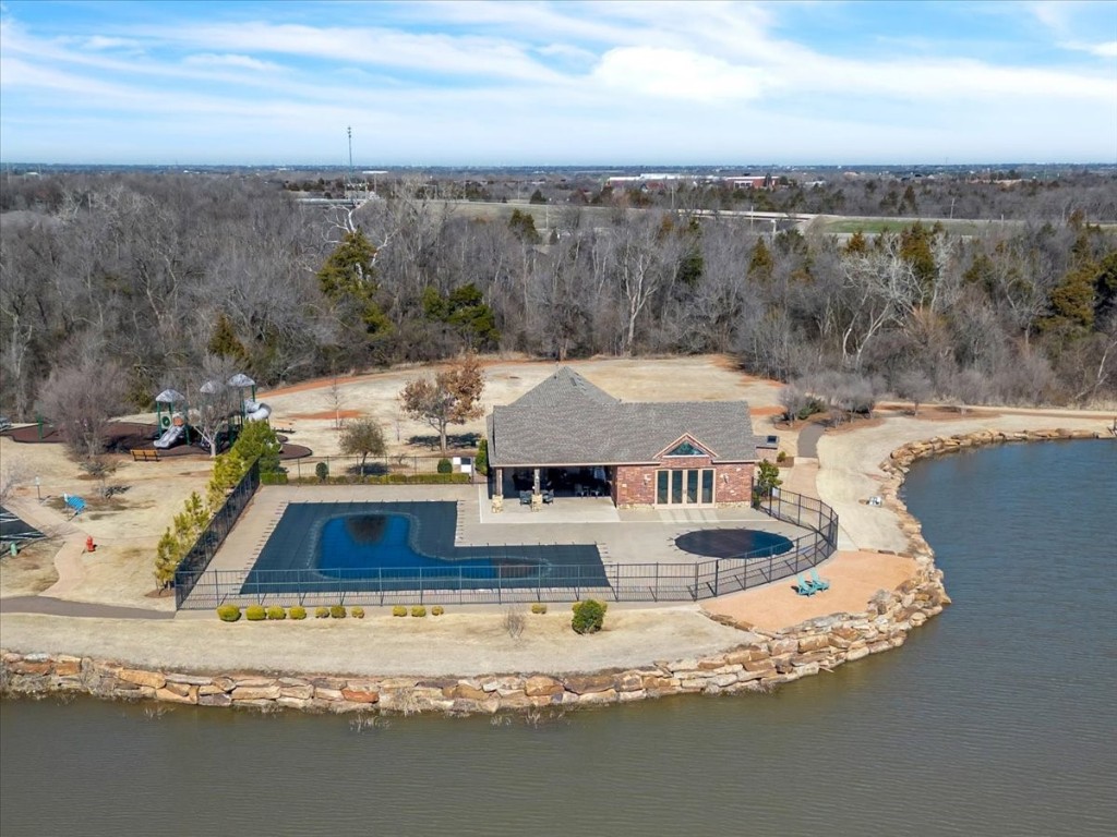 13504 Rock Canyon Road, Oklahoma City, OK 73142 birds eye view of property featuring a water view