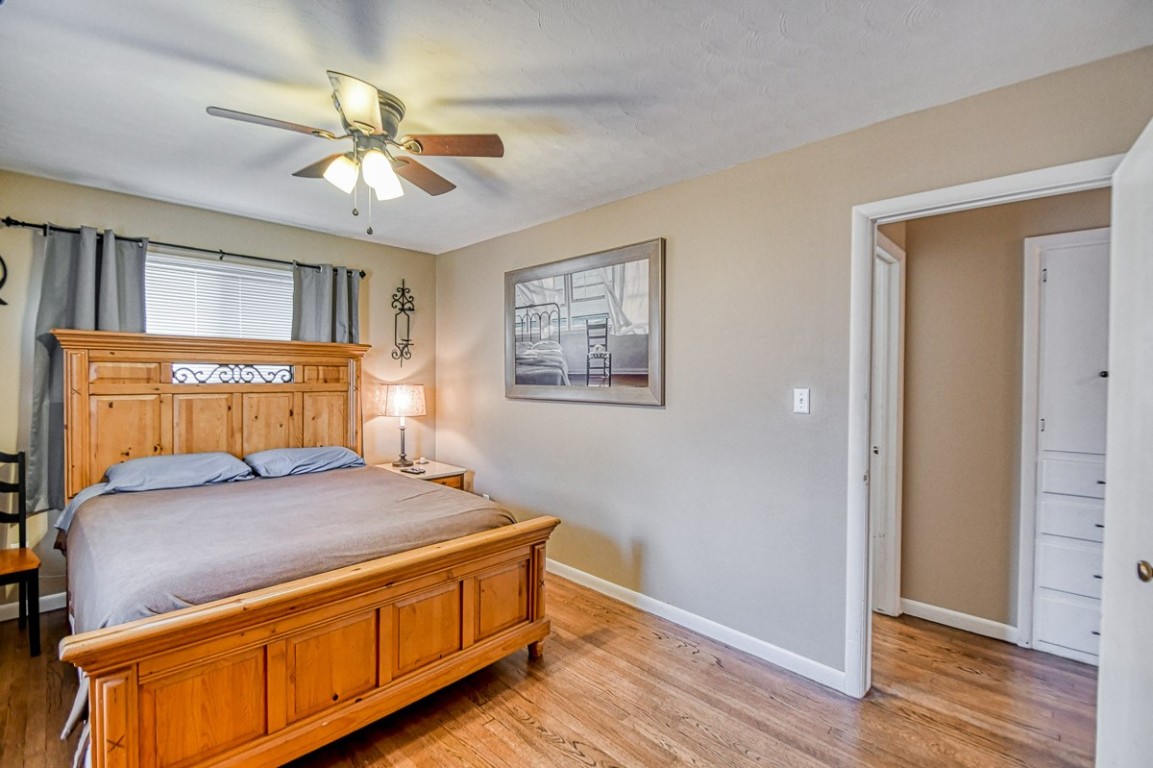 217 Byrd Drive, Midwest City, OK 73110 bedroom with light hardwood / wood-style floors and ceiling fan