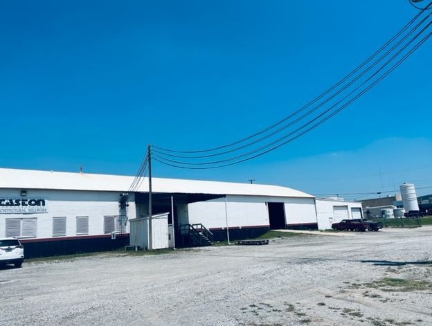 Former lumber warehouse with active BNSF rail spur in the heart of North OKC just north and west of the busy NW 63rd & I-235 (Broadway Extension) intersection, this insulated CMU block warehouse with arched TPO roof provides ample open space without columns for free movement within the warehouse.  Also, the 2,800 SF office portion is climate controlled and has 3 restrooms in addition to warehouse restroom.  Huge parking lot and room for lay down yard.