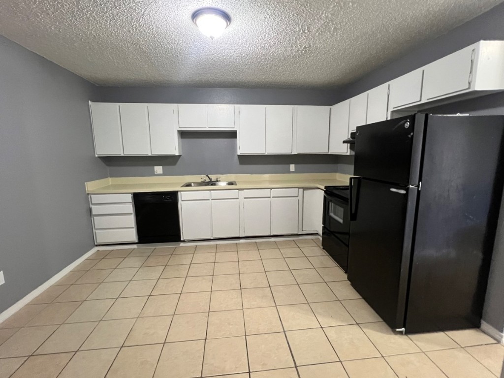 Cozy 2 bed 1.5 bath apartment for rent in Norman! Fridge provided washer and dryer hook ups in each unit!  Property has small back yard with privacy fence tenant responsible for grass inside yard.  Schedule your showing today! First 6 months at $750 and the last 6 months to be at $895. Pets allowed with monthly fee. NO SECTION 8.