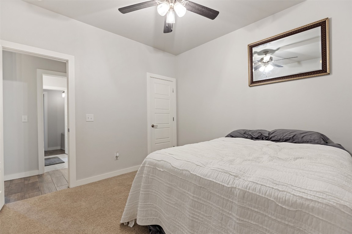 757 Acorn Bend, Piedmont, OK 73078 bedroom with ceiling fan and light hardwood / wood-style floors