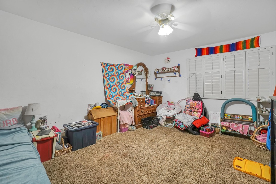 501 44 Highway, Foss, OK 73647 rec room with carpet and ceiling fan