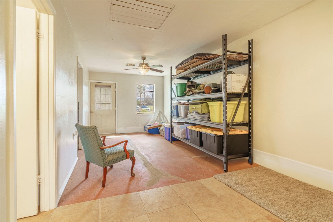 14655 NE 68th Street, Jones, OK 73049 sitting room with light tile flooring and ceiling fan