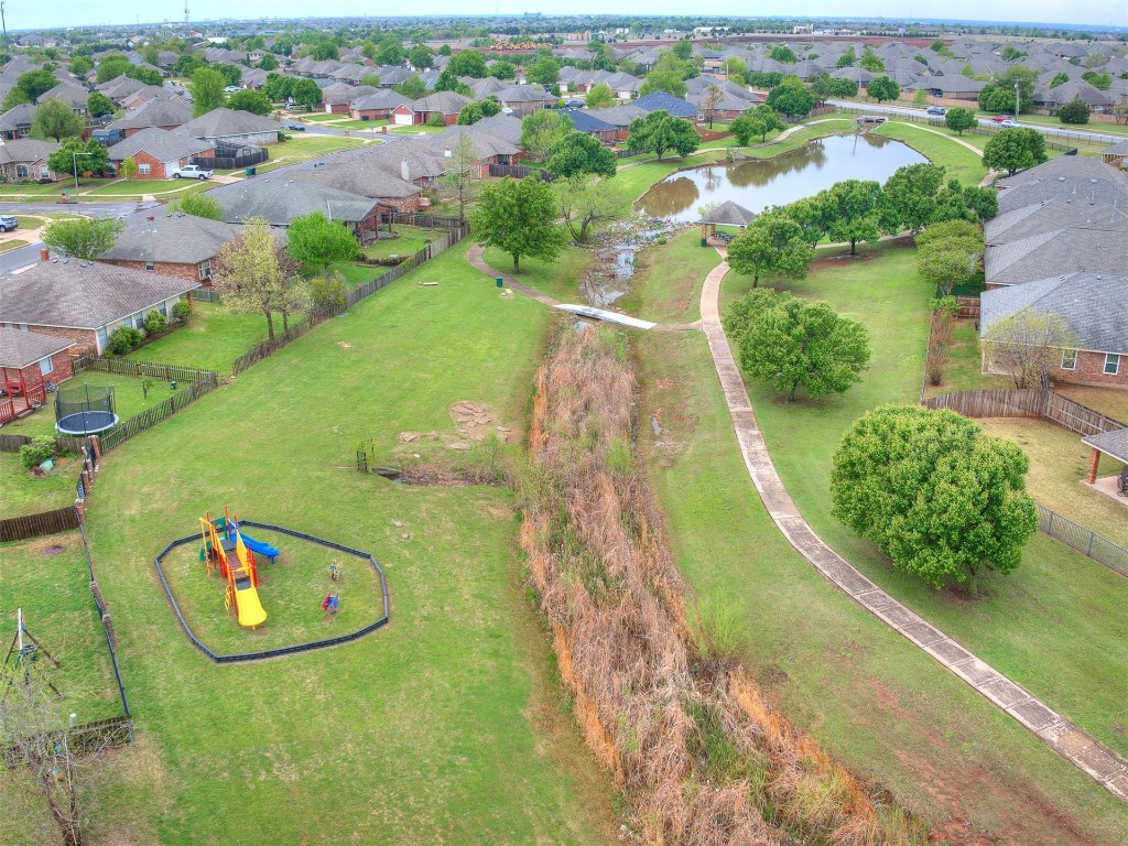17620 Palladium Lane, Edmond, OK 73012 aerial view with a water view