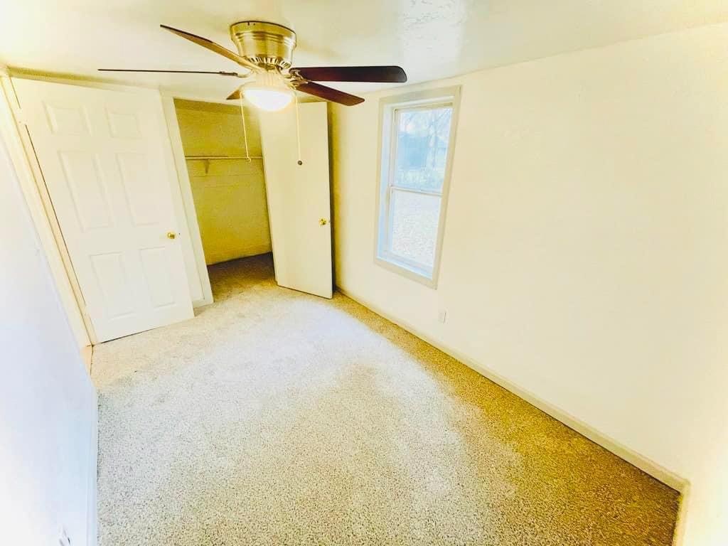 2701 SW 31st Street, Oklahoma City, OK 73119 unfurnished bedroom featuring a closet and ceiling fan