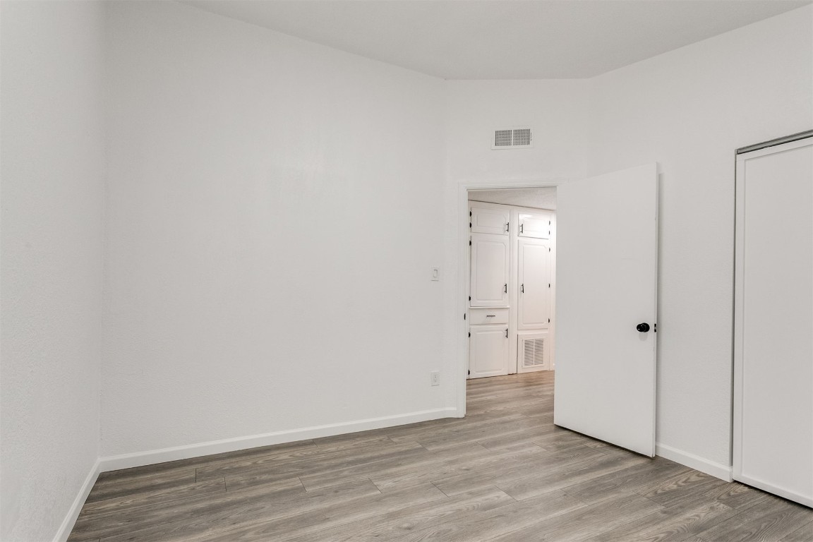 529 NW 92nd Street, Oklahoma City, OK 73114 empty room with light hardwood / wood-style floors