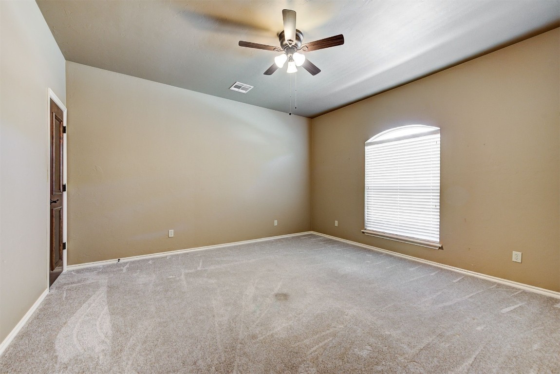 12600 N Rockwell Avenue, #78, Oklahoma City, OK 73142 carpeted spare room with ceiling fan