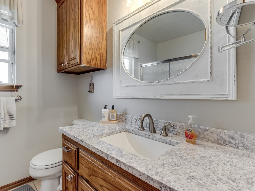 1161 Mill Ridge Drive, Blanchard, OK 73010 bathroom featuring toilet and vanity