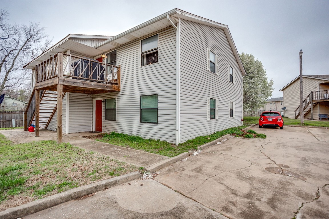 Great investment opportunity near Campus.  Three of the units are currently rented. Each unit has 2 beds 1 bath Inside utility room.  Living rooms have fireplaces and built-ins.  Ceiling fans are in living rooms and bedrooms.  Please do not disturb the  tenants.  Call for a showing today.