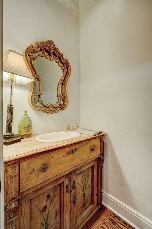 6324 Harden Drive, Oklahoma City, OK 73118 bathroom with ornamental molding and vanity