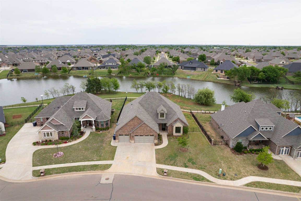 12712 Bristlecone Pine Boulevard, Oklahoma City, OK 73142 birds eye view of property with a water view