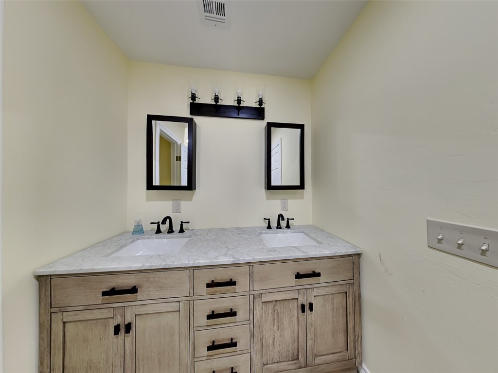 2341 NW 11th Street, Oklahoma City, OK 73107 bathroom with dual bowl vanity