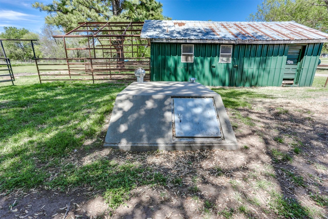 1841 E Fox Lane, Newcastle, OK 73065 view of storm shelter with a yard