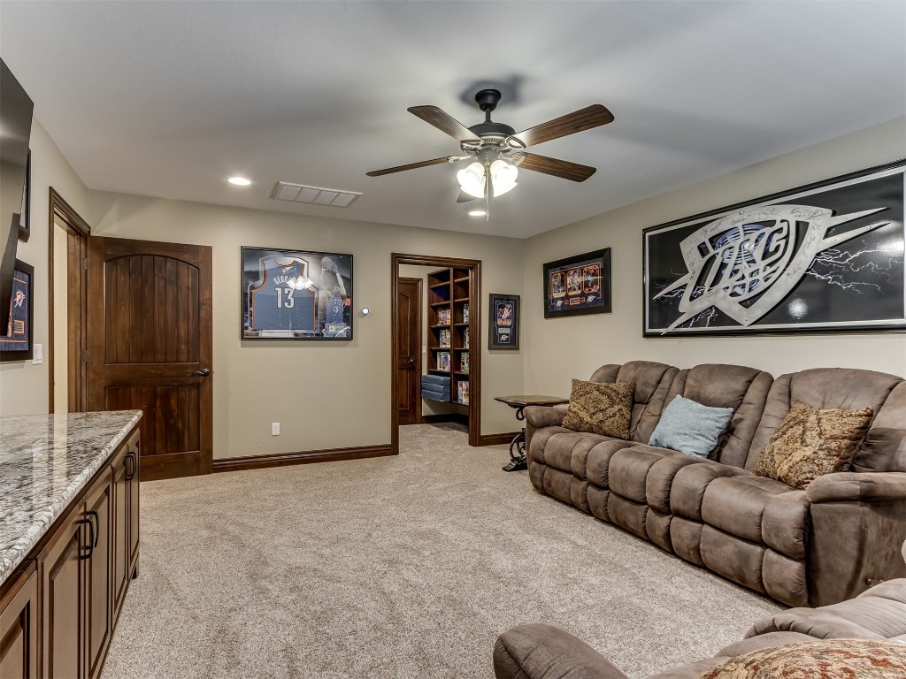 9701 Nawassa Drive, Midwest City, OK 73130 carpeted living room with ceiling fan