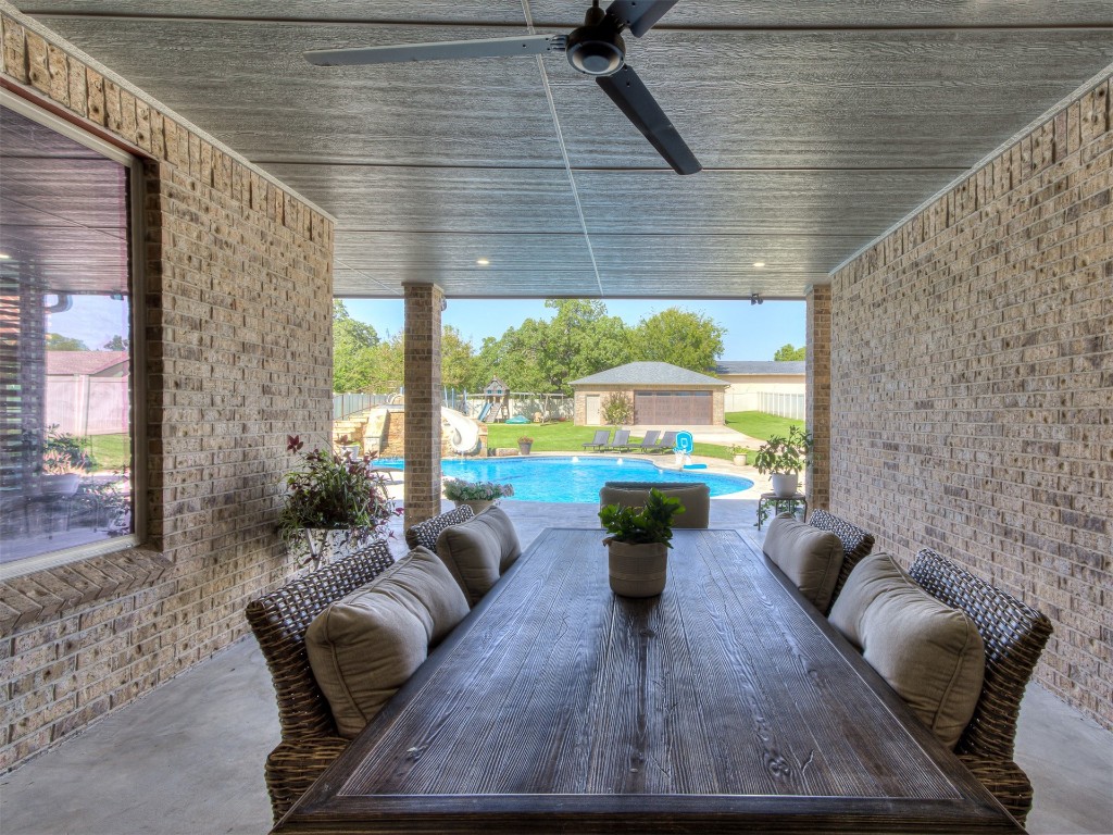 9701 Nawassa Drive, Midwest City, OK 73130 view of patio / terrace with an outdoor hangout area, ceiling fan, and a fenced in pool