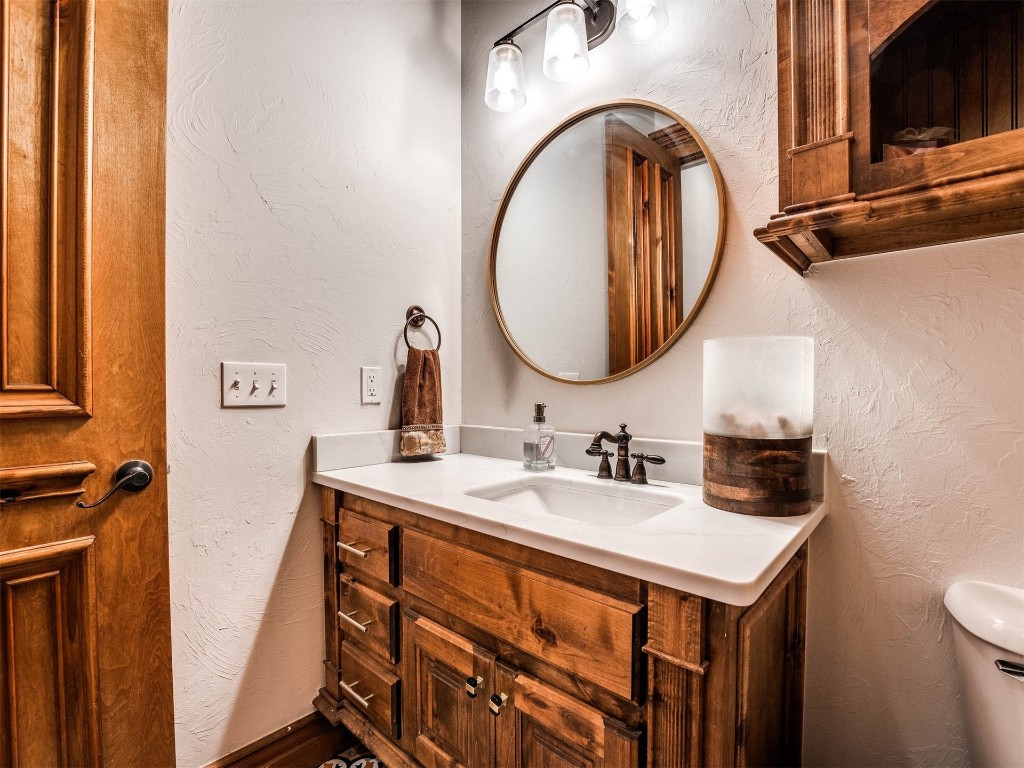 5501 NW 132nd Street, Oklahoma City, OK 73142 bathroom featuring vanity and toilet